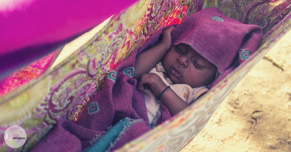 Baby sleeping in a hammock (in India)