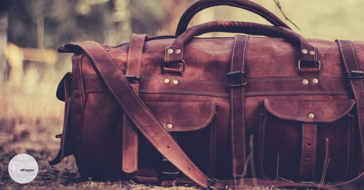 A leather holdall (dad hospital bag) on the ground