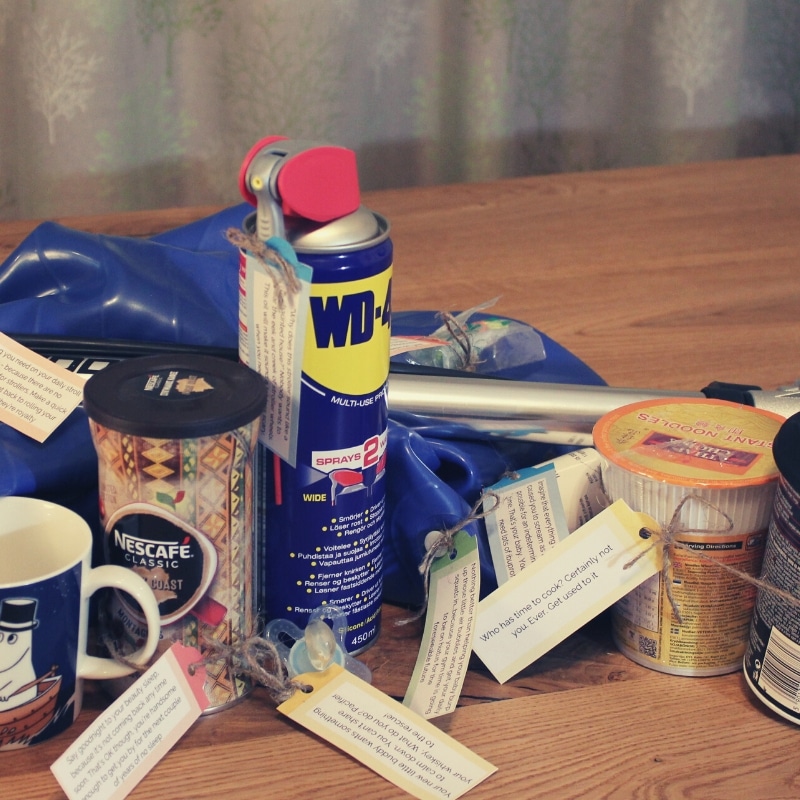 Many items for dad (from the article "Ned dad survival kit") on the table