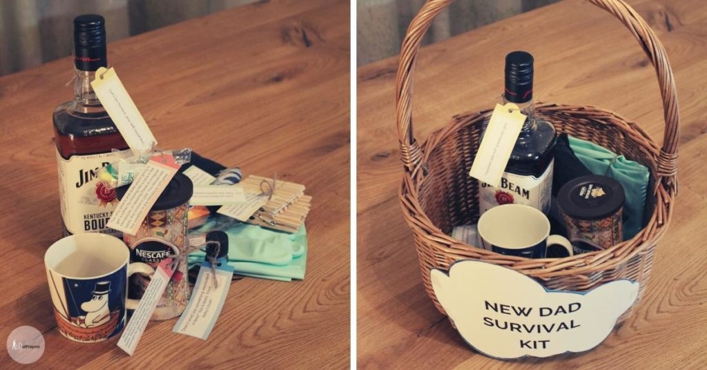 Comprehensive new dad survival kit- all listed items in a basket on wooden table