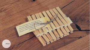 New dad survival kit Clothespins example on a table with a label
