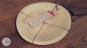 New dad survival kit Disposable Plates example on a table with a label